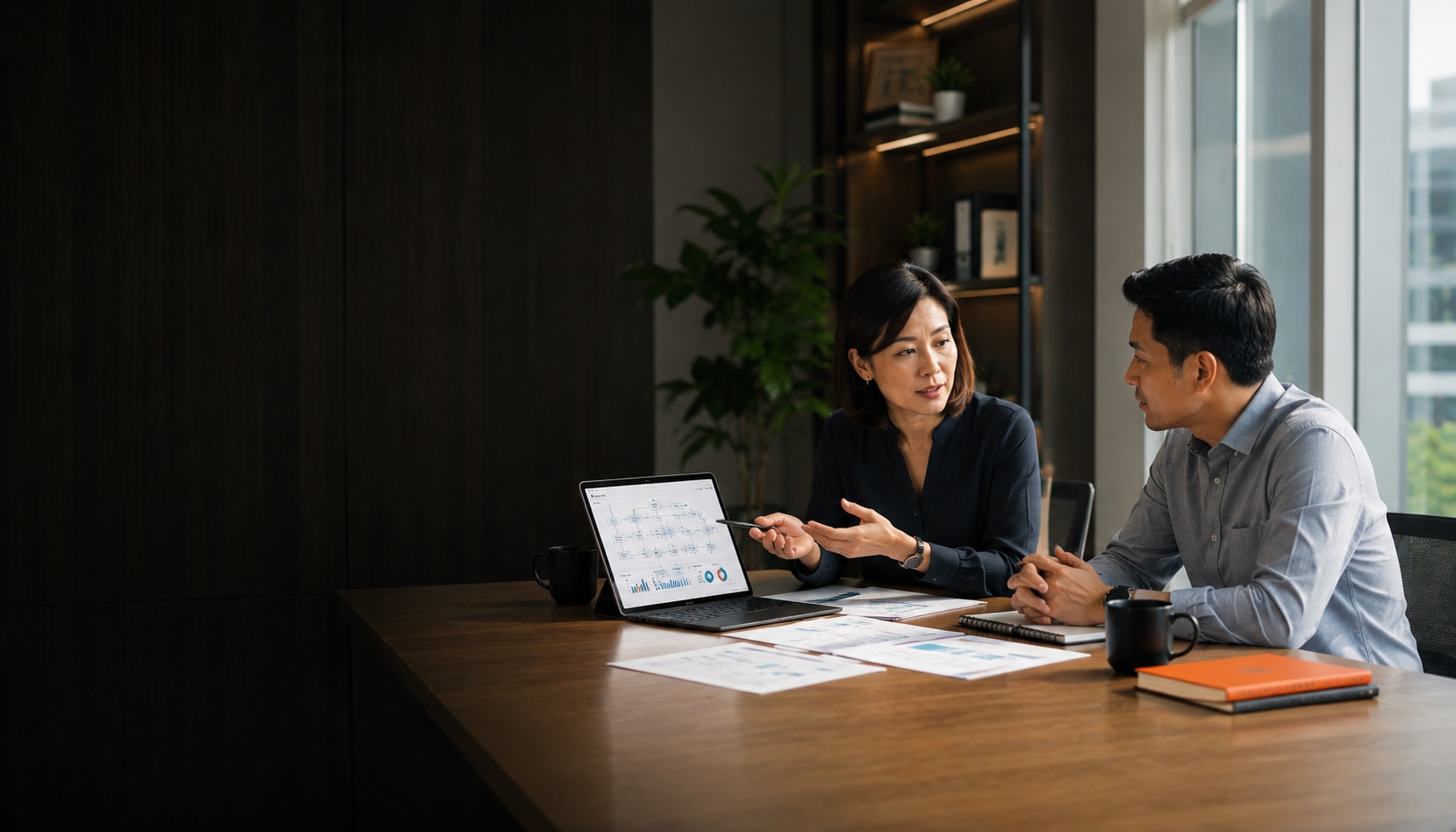 BPO Services Thailand — People Profilers consultant reviewing business process workflow and operations dashboard with client