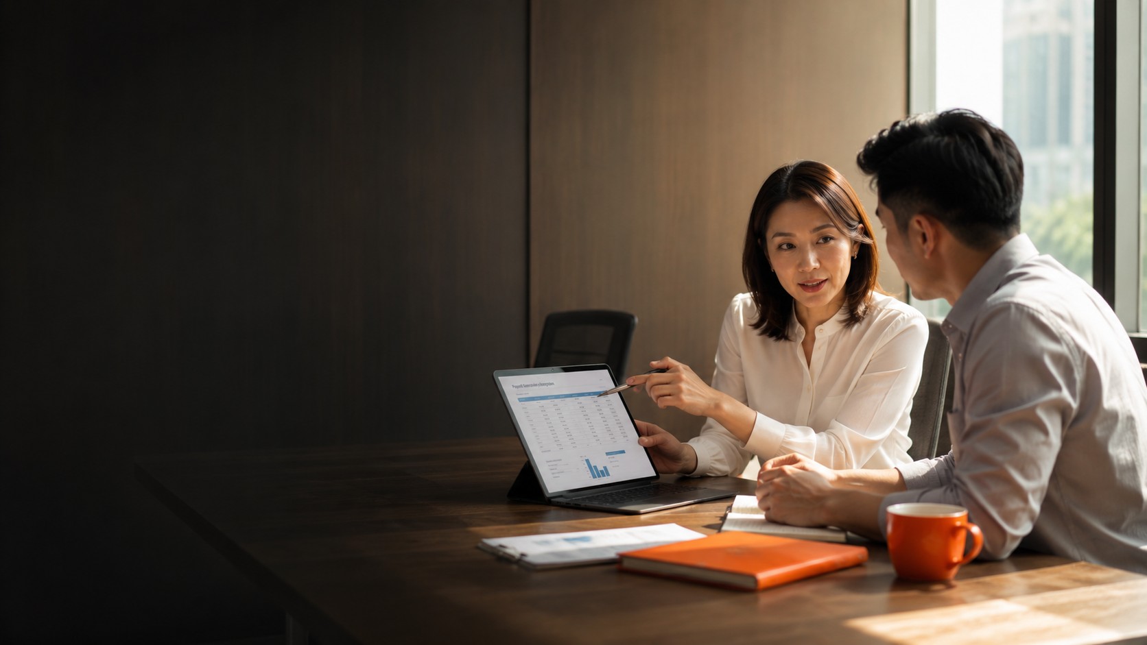 Payroll Outsourcing Thailand — People Profilers payroll consultant reviewing monthly payslip report and statutory contributions with client